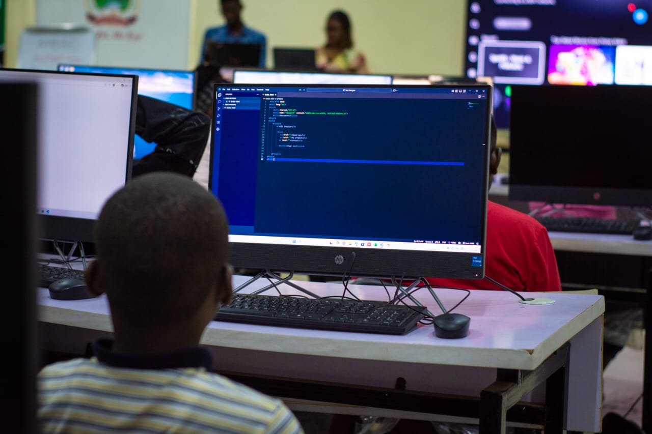 Young learner working on a coding project